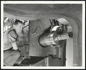 Giant Engraver Cuts 1941 Ford Roof Die -- One of the scores of specialized tools in the Ford Motor Company's new tool and die shop, Dearborn, Mich., is this automatic engraving machine, largest of its kind, shown here shaping the contour of a big steel roof die for the 1941 Ford Motor car. Tools and dies for every department in the Ford Rouge plant are produced in the now sight-acre building which houses $3,000,000 worth of machine tools like this one.