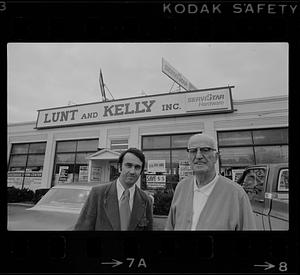 Peter and Edward Kelly in front of Lunt and Kelly hardware store