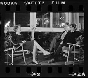 Florence, Robert, and Lea Pearson seated on patio