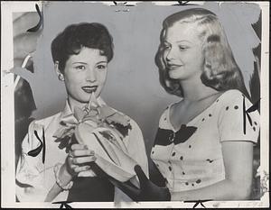 Beauty queens comparing fashion notes