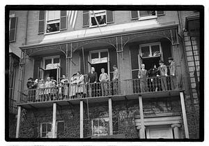 People standing on a balcony