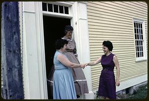 Women greeting each other on the bicentennial house tour