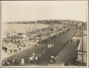 Cars parked by Revere Beach