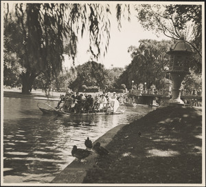 People riding a Swan Boat in the Boston Public Garden