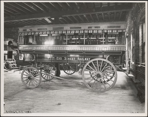 Old street car. Horse wagon wheel
