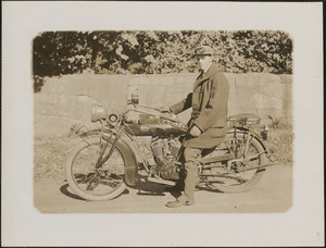 Phillip Smith on Indian motorcycle, Perkins Street, near Ward's Pond