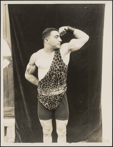 Circus strongman posing