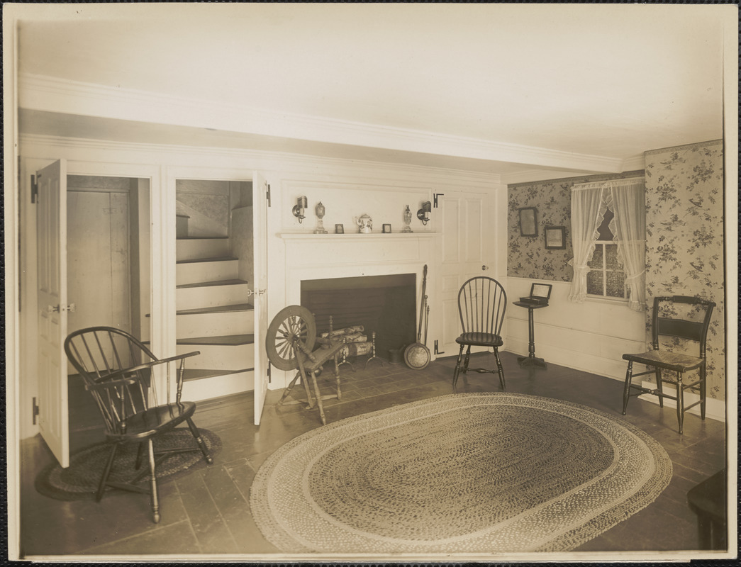 Roger G. Pierce east room with fireplace and two open doors, stairway seen through one door (interior)