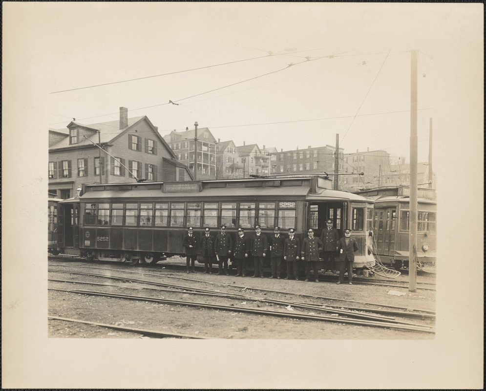 Ten street railway employees in front of South Huntington Avenue streetcar