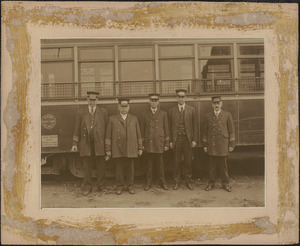 Five Boston Elevated Railway Company employees posing beside streetcar