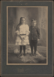 Studio portrait of a boy and a girl