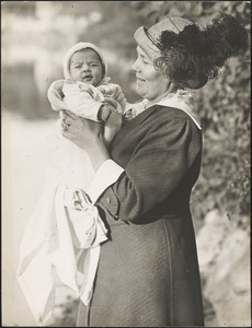 Alma Abdalian holding a baby