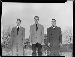 Three men in suits and ties