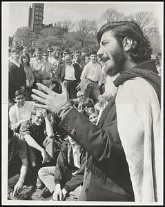 Hippie Hopeful for President Louis Abolafia sports a Lincolnesque beard and a Roman type toga as he exhorts onlookers to vote for him and his flower power platform in 1968. The oratory was a part of hippie love-in Sunday on the Common.