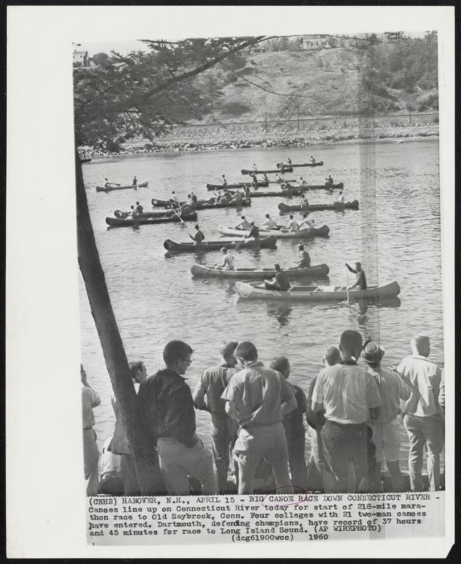 Big Canoe Race Down Connecticut River Canoes line up on Connecticut