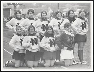 Newburyport cheerleaders don’t bow to anyone, even though a few do kneel on the job now and then. Front, from left, Denyce Collins, Holly Lynch, Karen Checkowny and Capt. Jane Russell. Rear, Debbie Wile, Anne Tartaro, Jayne Henneberry, Judy Wile, Alana Meluzzi, Betsey and Kelleher.