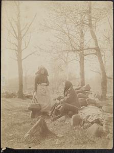 Women sitting on rocks