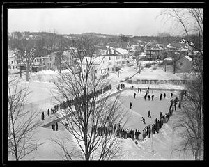 Ice hockey being played outdoors