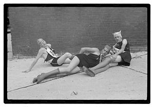 Three men posing wearing sashes, Boston Park Department Circus entertainers