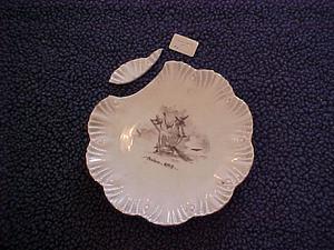 Damaged plate with a painted figure