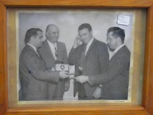 Photographic portrait of four men