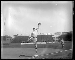 Boston 1st baseman jump for ball