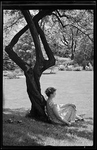 Woman near a tree