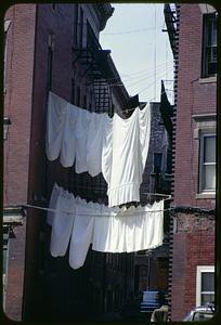 Laundry on line between buildings