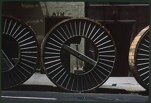 Wheel labeled "Western Electric" in row of wheels, Manhattan