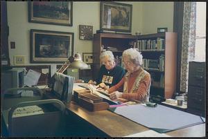 Circulation Desk, left to right: Rose Pixley, Josie Tristany