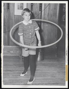 Rebecca (Becca) Wathen-Dunn, now 12, shows she has mastered the art of hula-hooping.