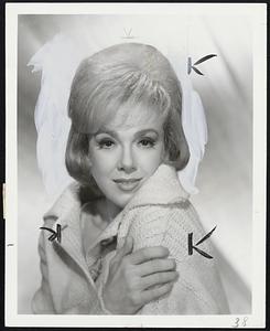 Edie Adams, popular comedienne and singer, who opens a one week engagement tomorrow night at Blinstrub's.