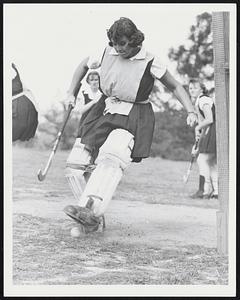 Goaltender Barbara Olnsky of Brighton playing in a field hockey match at Bouve-Boston hockey field