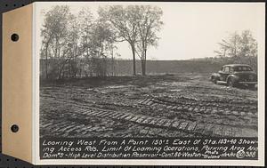 Contract No. 80, High Level Distribution Reservoir, Weston, looking west from a point 150 feet+/- east of Sta. 103+40 showing Access Roads limit of loaming operations, parking area and dam 5, high level distribution reservoir, Weston, Mass., May 29, 1940