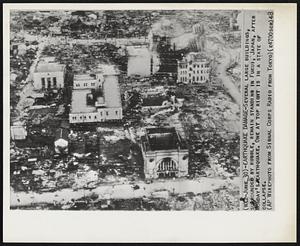 Earthquake Damage- Several large buildings, surrounded by rubble, remain standing in Fukui, Japan, after Monday's earthquake, One at top right is in a state of collapse.