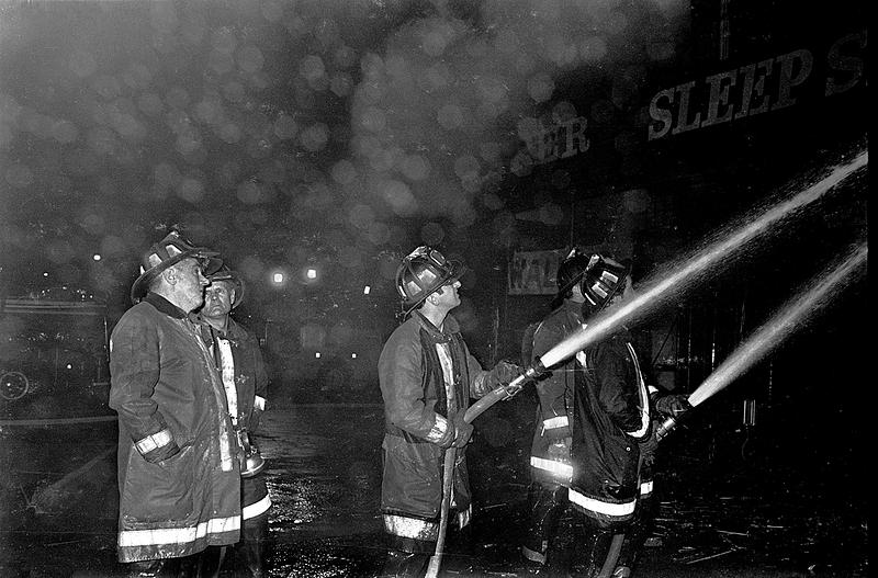 On the left Chelsea L1 Capt. John Doherty and firefighter Phil Dalis center with a line on the fire