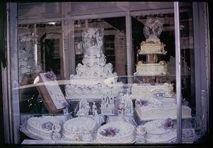 Cakes displayed in a store window