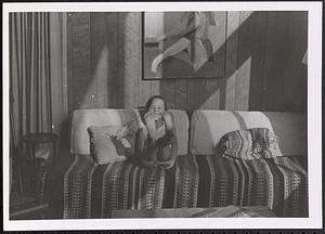 Girl sitting on a couch
