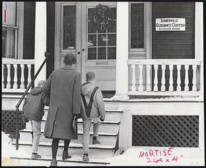 Mother & Children arriving at Somerville Guidance Center. Mrs. Wm. Frances Ackerly + sons. John & Spaff.