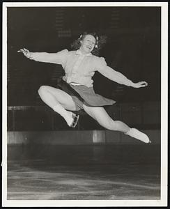 Mary Simpson, of Banff, Canada, who will be featured in a figure skating solo, in the Commonwealth Skating Club's, First Ice Revue to be held at Boston Arena, Friday evening, March 6th.