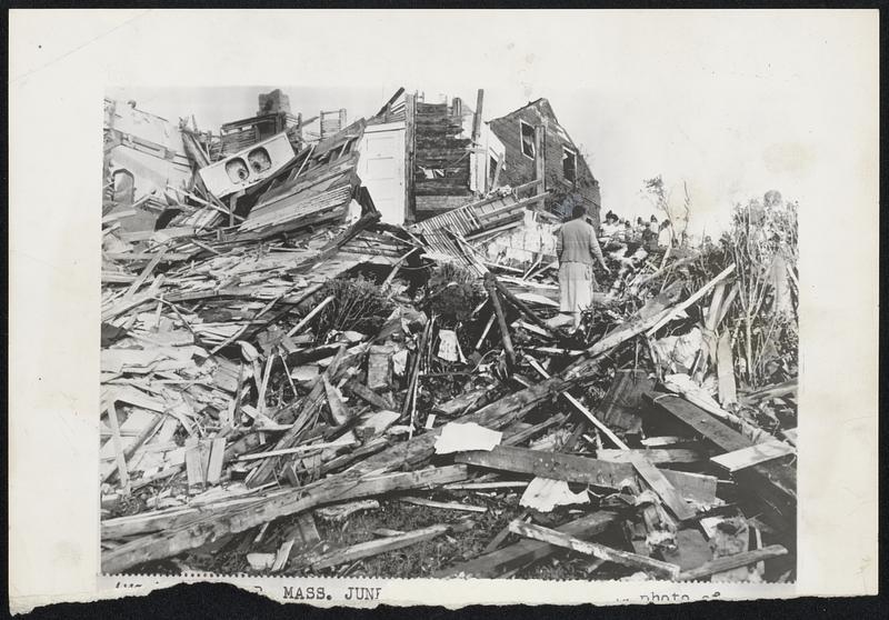 Tornado Destruction in the new $20,000,000 Great Brook Valley government housing project in Worcester. Several persons were killed in the development and workers were digging in the debris late last night for others who were missing.