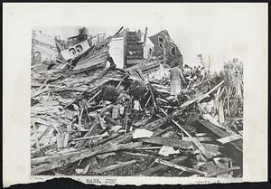 Tornado Destruction in the new $20,000,000 Great Brook Valley government housing project in Worcester. Several persons were killed in the development and workers were digging in the debris late last night for others who were missing.