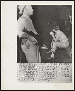 State Officer Questions Klan Lookout--A state investigator(foreground with face obscured) armed with a submachine gun, is shown last night as he questioned a lookout at a Ku Klux Klan meeting. The lookout, seated on the running board of a car, turned his head as the picture was taken. The state officers said another of the lookouts was armed with a pistol and carried a special deputy sheriff’s commission.