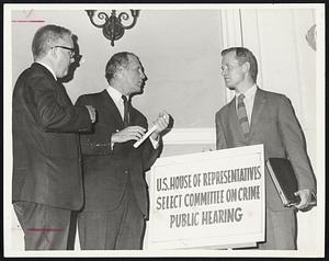 Mayor White, center, during break in federal crime hearings at Faneuil Hall chats with Francis J. O'Rourke, left, director of administration of justice for the City of Boston, and John Fiske, police department attorney.