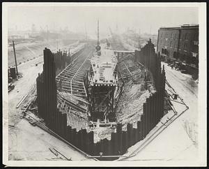 Huge Docks erected in New York. A view of the inshore section of the new Todd graving dock in the Erie Basin, Brooklyn. The new dry dock, largest in New York cost $2,500,00. FS.