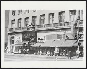 Facelifting Plus. The Hopkins Building in Bakersfield, Calif., after restoration which removed all traces of the extensive damage caused by the 1952 earthquake. The exterior walls were reinforced with steel and concrete. Badly damaged inside walls were strengthened, and in some instances, replaced. Two years after the shocks, the city is in the midst of a reconstruction boom which is bringing big improvements, many new buildings, and an increased population.