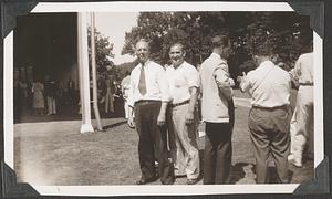 Two unidentified men posing in front of the Koussevitzky Music Shed