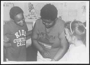 Leah, Liz, and a young girl back in the day