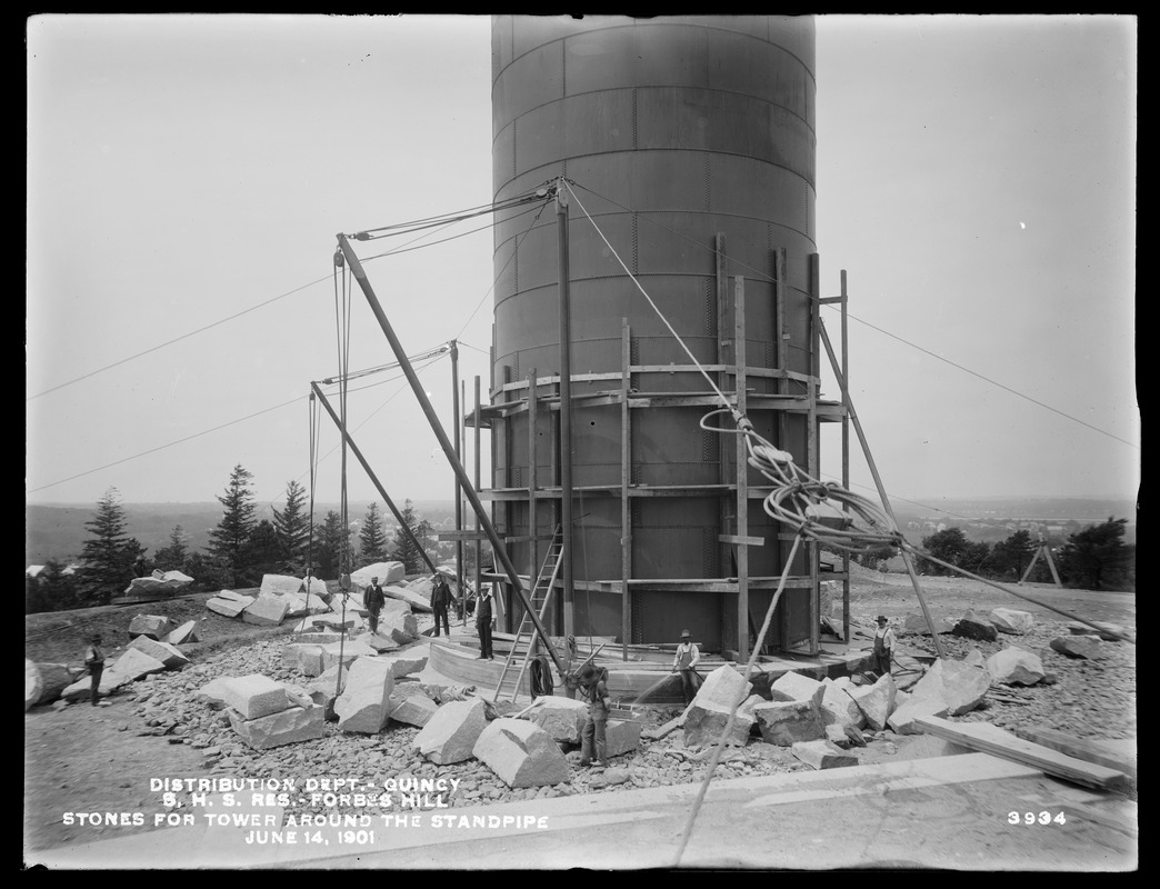 Distribution Department, Southern High Service Forbes Hill Reservoir, building the stone tower around the Standpipe, Quincy, Mass., Jun. 14, 1901