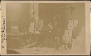 Photograph of the artist Childe Hassam in his studio